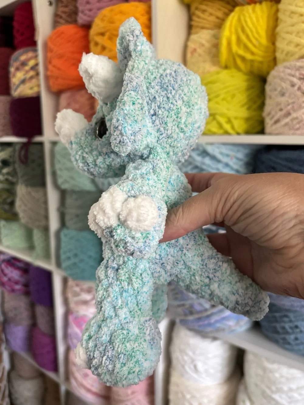 Crochet baby Triceratops plush.